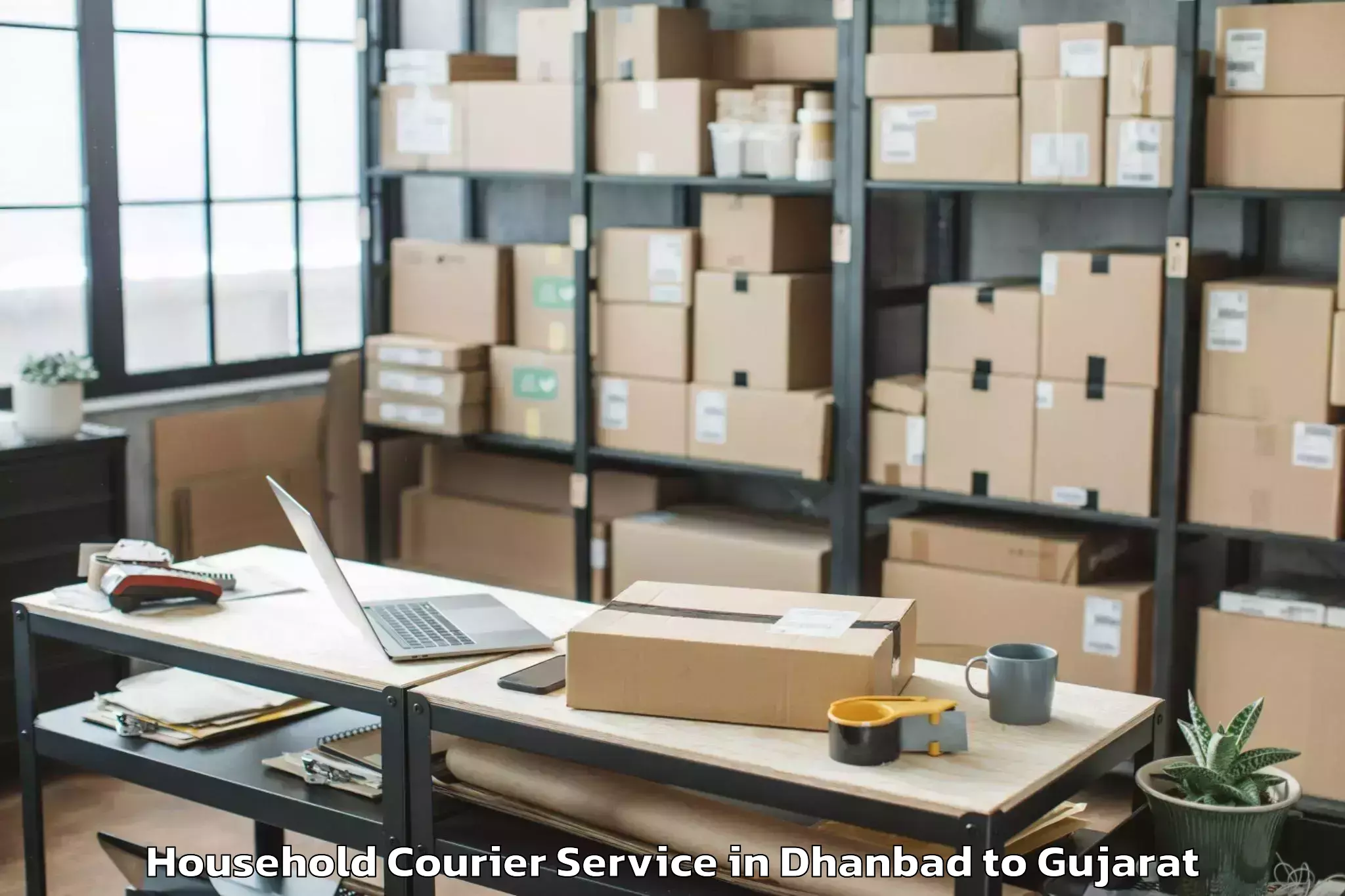 Reliable Dhanbad to Abrama Household Courier